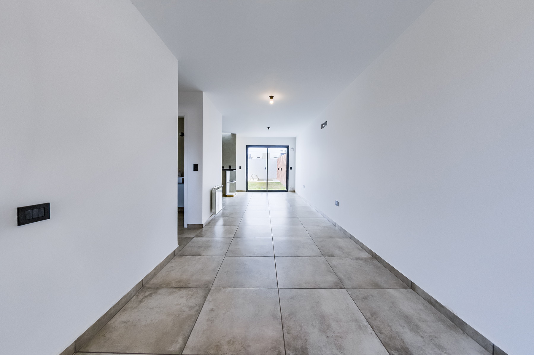 Interior Bogi 2 Interior del duplex con iluminación natural