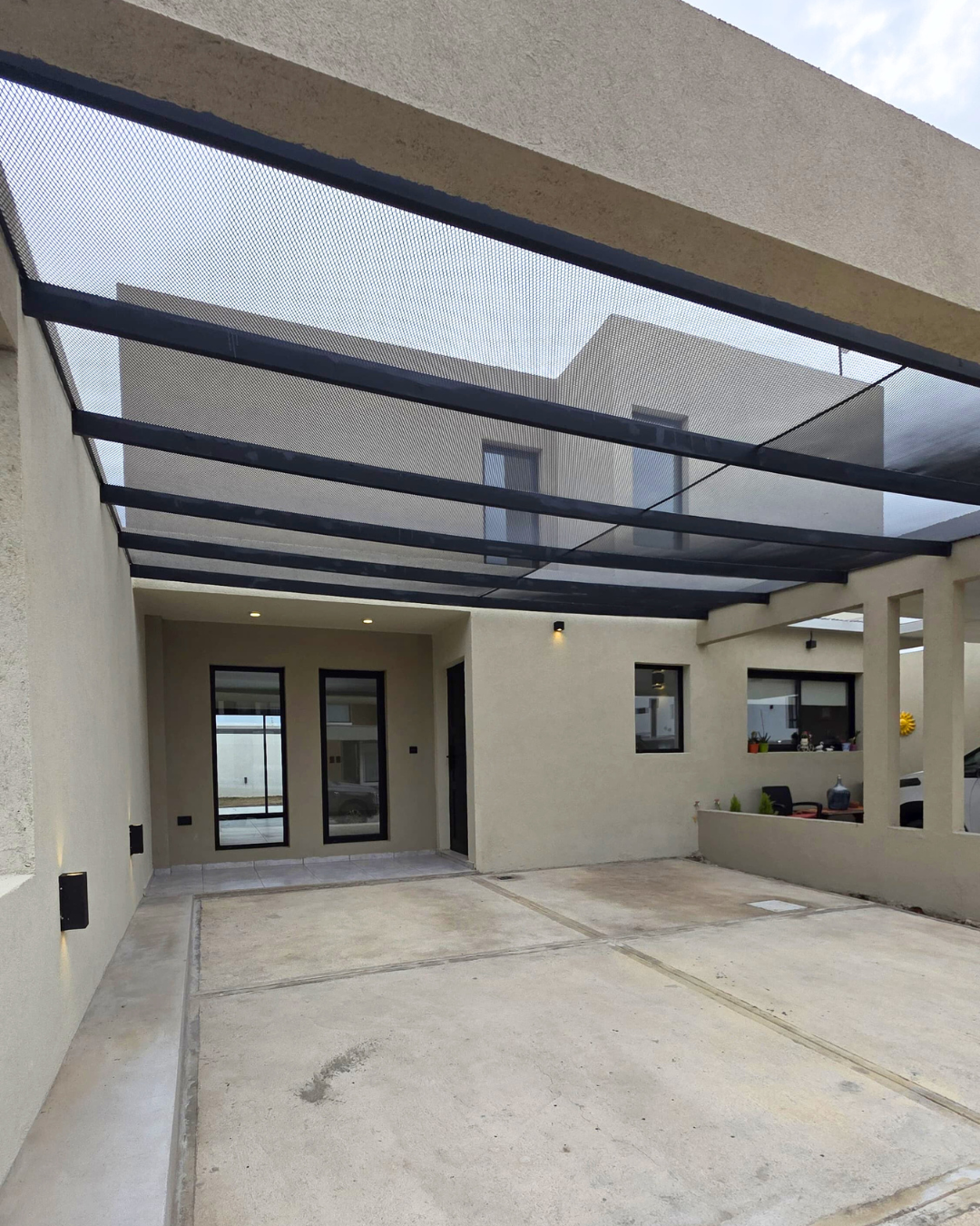 9. AM2 1 Frente de la vivienda AM2 en Córdoba, obra terminada.