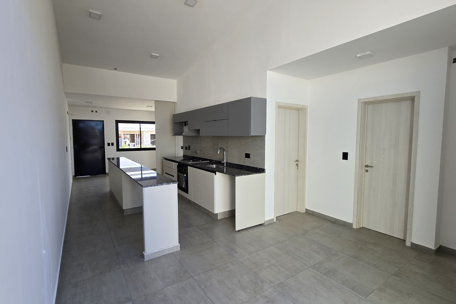 cocina-integrada-cocta12 Amplitud y luz natural.