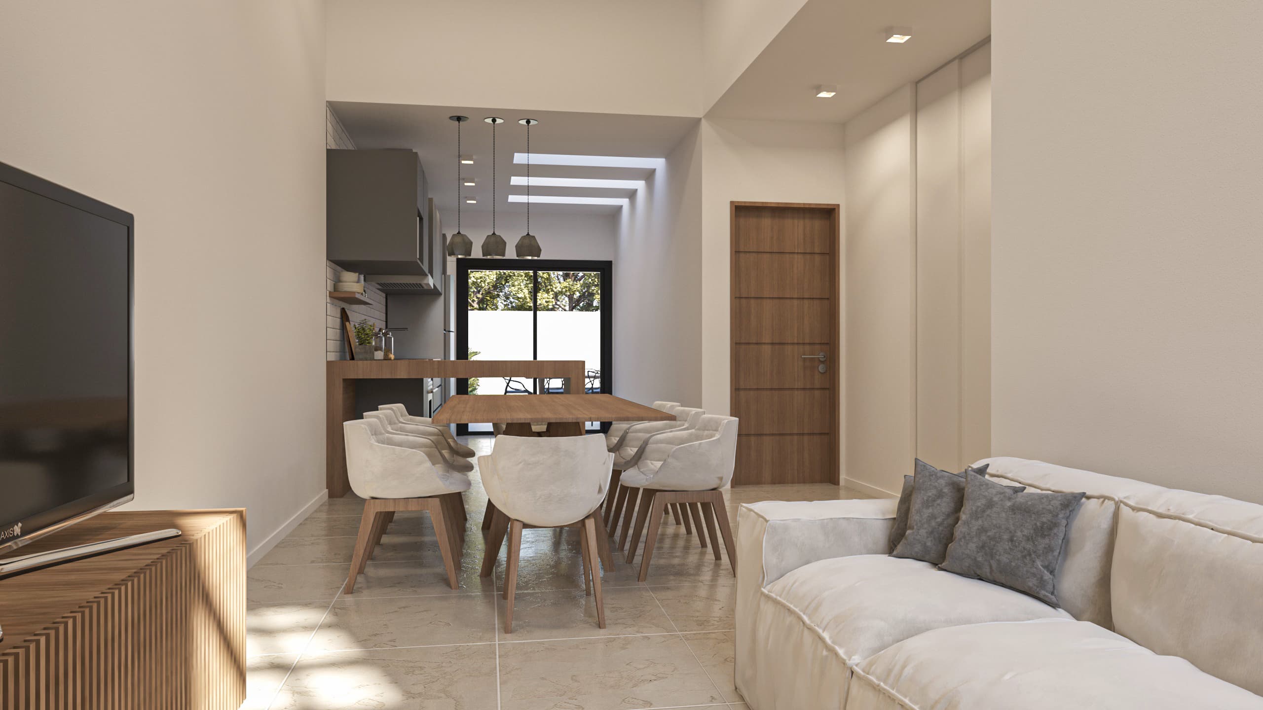 interior-salon-boggi-3 Amplio salón-comedor que destaca por su conexión con la cocina y el patio, creando un ambiente espacioso y luminoso.