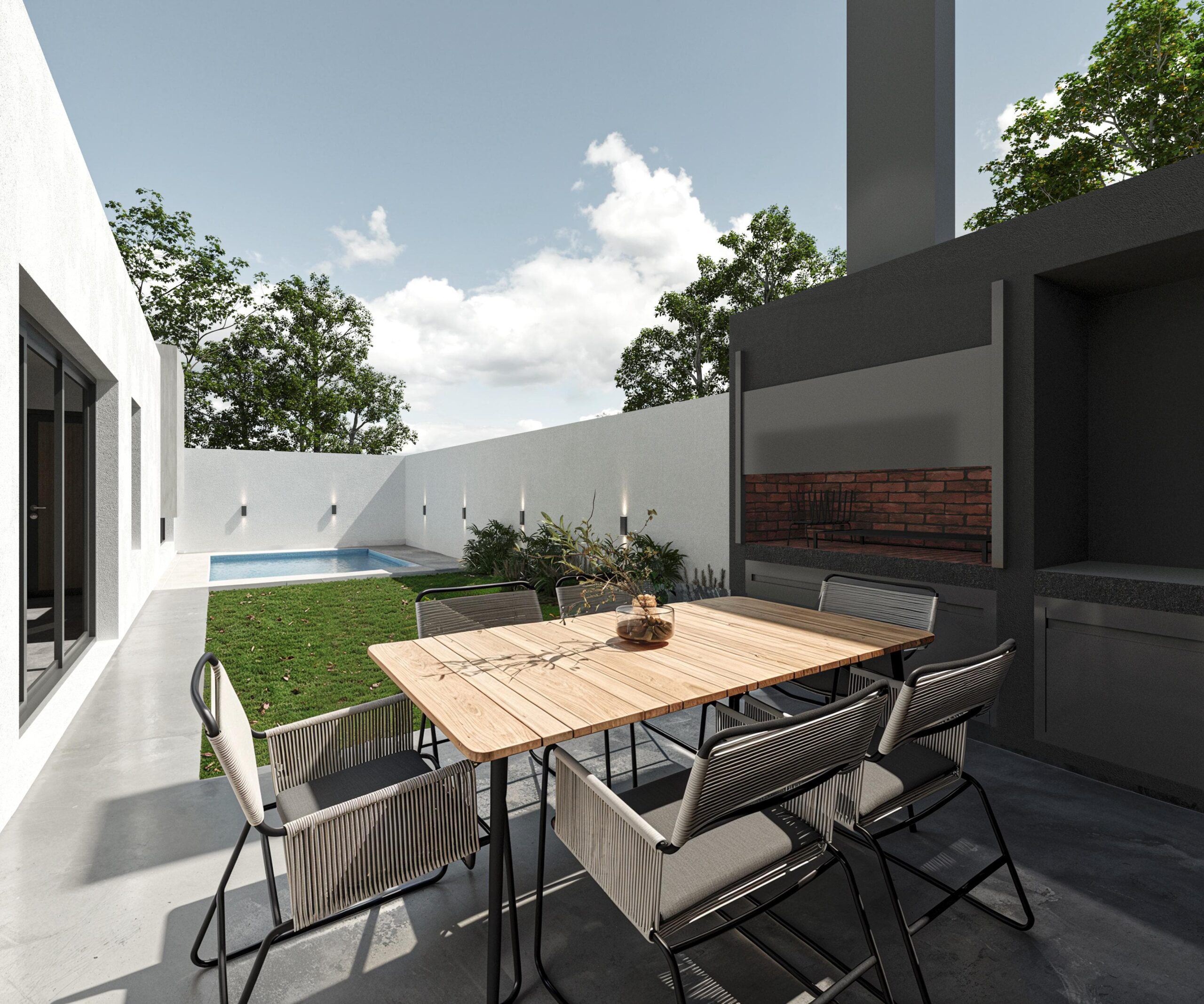 exterior-casa-docta Patio con galería, asador y mesa exterior en vivienda moderna en Córdoba